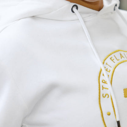 Sweat à capuche blanc avec broderie métallisée dorée
